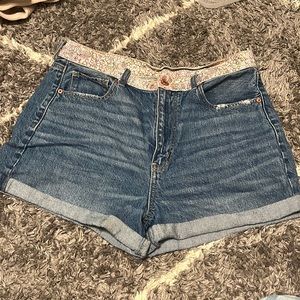 Size 12 Jean shorts with floral boarder.